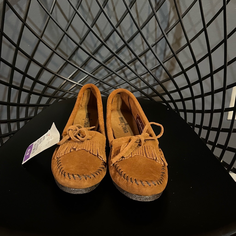 Brand new minnetonka size 8.5
